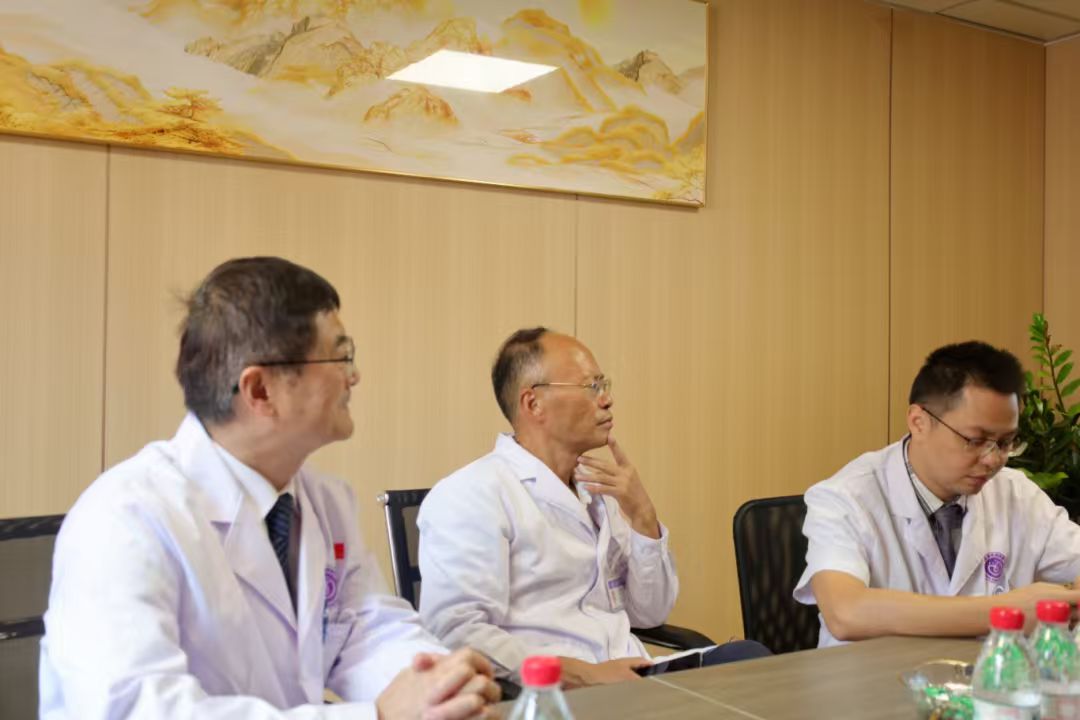 Medical specialists taking part in a multidisciplinary consultation meeting